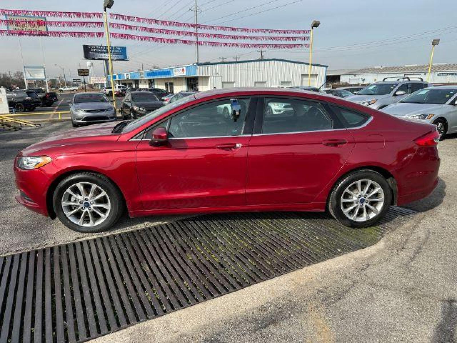 2017 RED Ford FUS SE (3FA6P0HD0HR) with an 1.5L L4 DOHC 16V engine, 6-Speed Automatic transmission, located at 2715 W Pioneer Pkwy, Arlington, TX, 76013, (817) 265-9009, 32.710262, -97.153236 - Photo #1